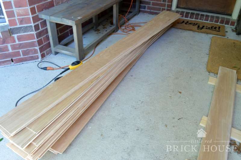 a stack of cut plywood planks
