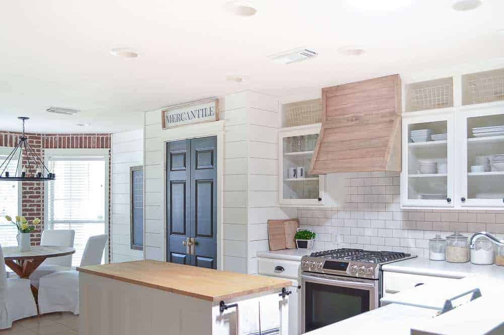 farmhouse style kitchen makeover view of dining room and pantry