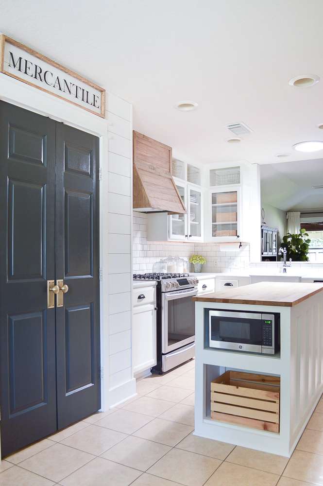 farmhouse style kitchen makeover view of islands